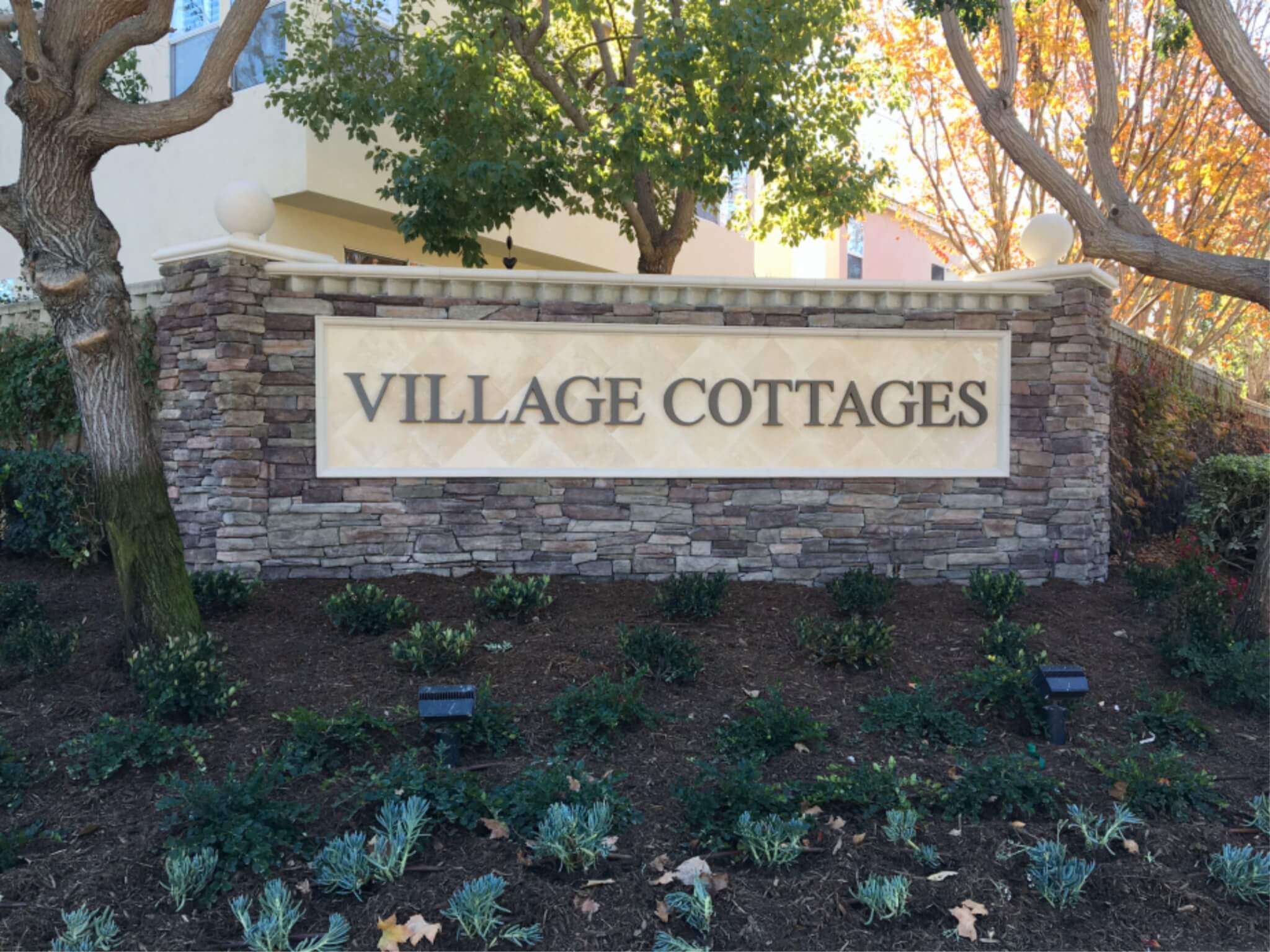 Village Cottages Wall Sign